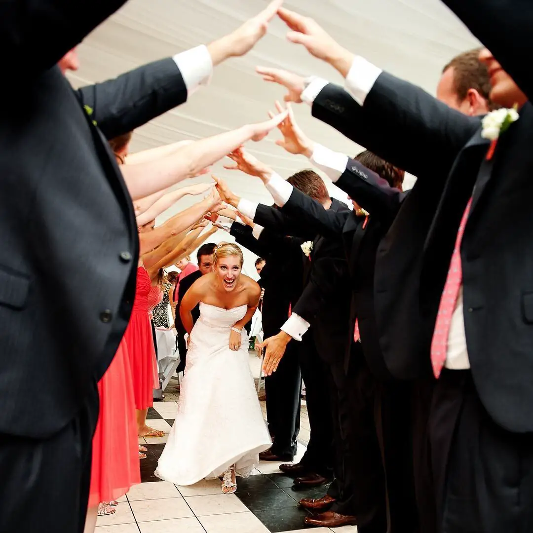 Couple walking through a wedding sparkler send-off