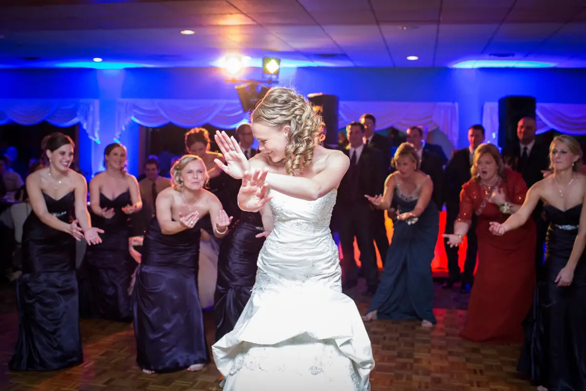 Uplighting washing a Finger Lakes wedding reception in color